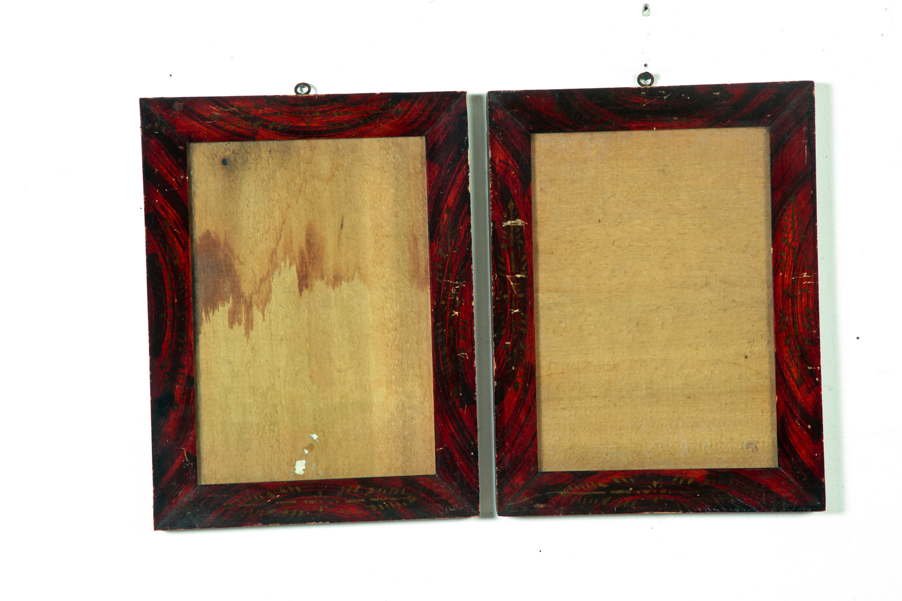 Appraisal: PAIR OF AMERICAN DECORATED FRAMES Mid th century Grain-painted and