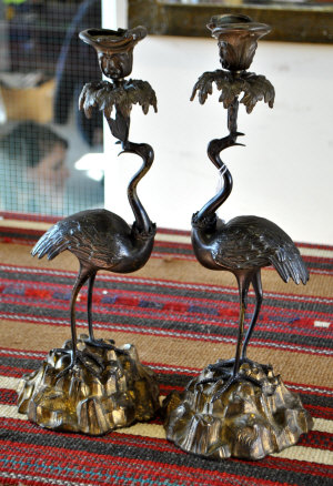 Appraisal: A pair of cast gilt metal and bronze candlesticks formed