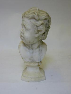 Appraisal: A VICTORIAN WHITE MARBLE BUST of a cherub modelled looking