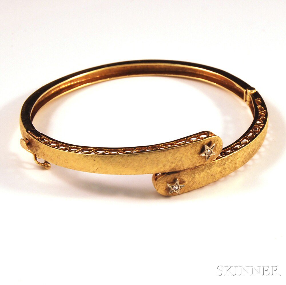 Appraisal: Brushed kt Gold and Diamond Bypass Bracelet the hinged bangle