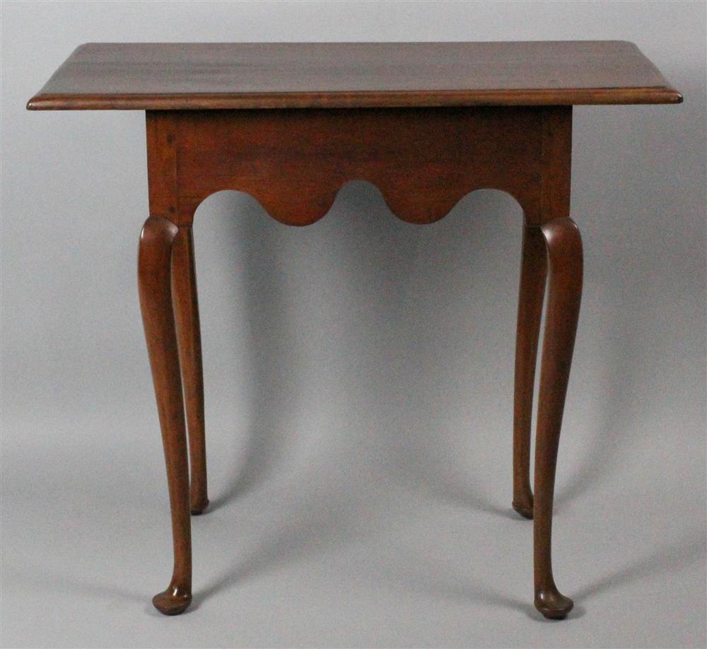 Appraisal: QUEEN ANNE CHERRYWOOD TAVERN TABLE rectangular top above shaped apron