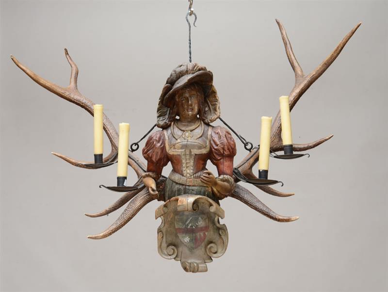 Appraisal: AUSTRIAN PROVINCIAL PAINTED WOOD AND ANTLER FOUR-LIGHT CHANDELIER Centrally carved