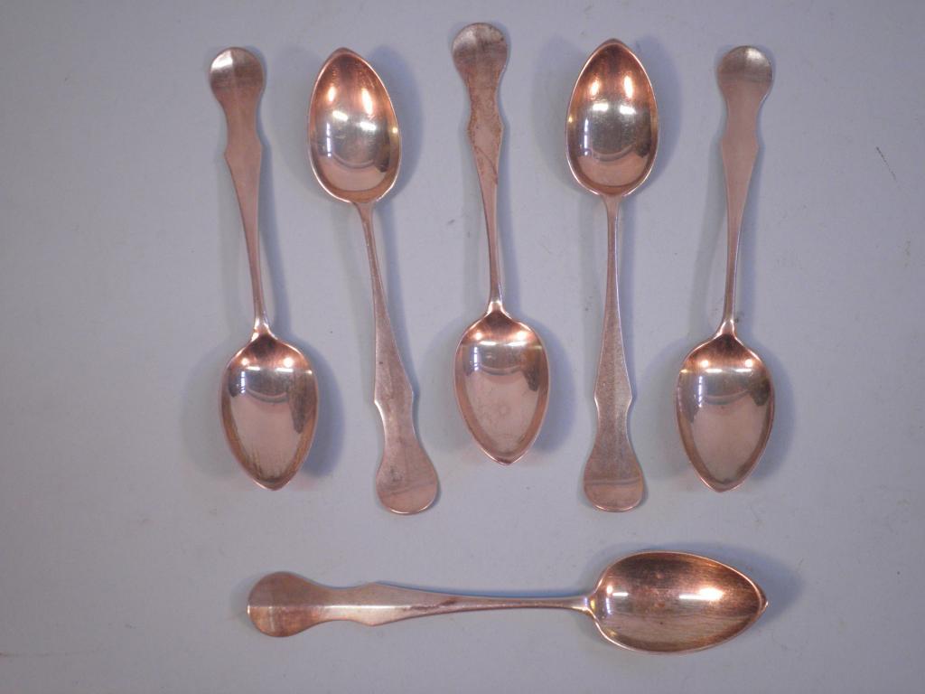 Appraisal: A set of six silver teaspoons each with a shaped