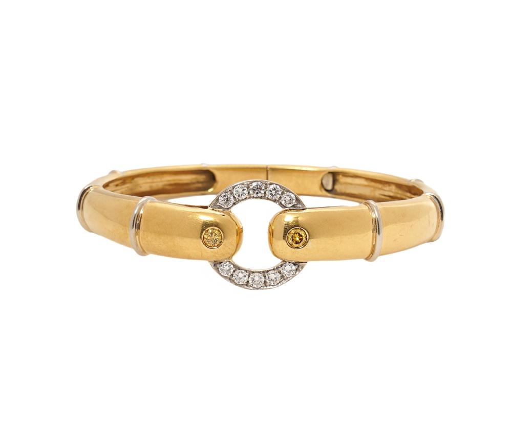 Appraisal: CONTEMPORARY K YG COLORED DIAMOND BANGLE K yellow gold and