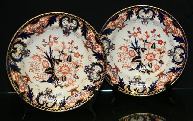 Appraisal: Pair of Crown Derby dessert dishes heavily decorated in the