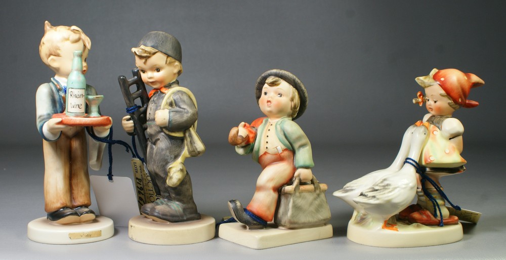 Appraisal: Hummel figurines Waiter Hum Goose Girl Hum some crazing Merry