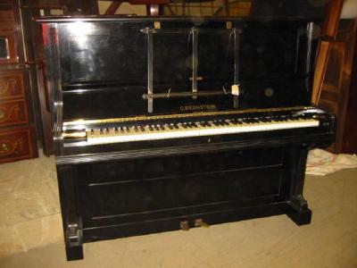 Appraisal: AN UPRIGHT PIANO by C Bechstein the iron frame with