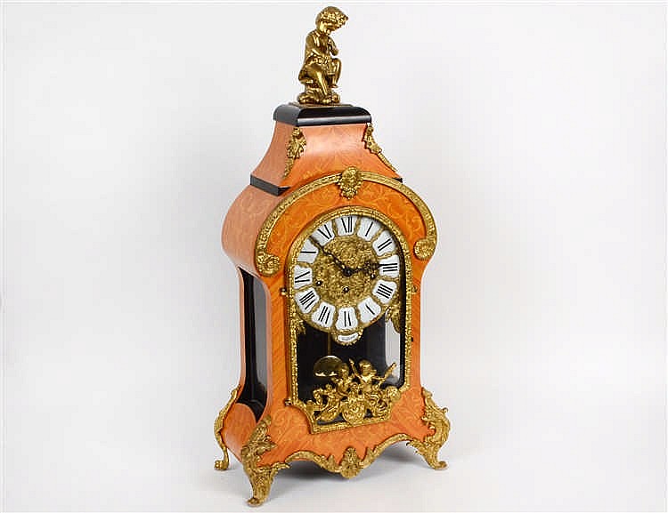 Appraisal: BRONZE MOUNTED FAUX MARQUETRY CARTEL CLOCKModern The movement German probably