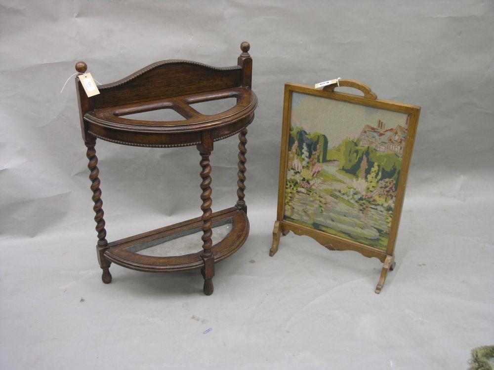 Appraisal: A solid dark oak hallstand barley twist uprights complete with