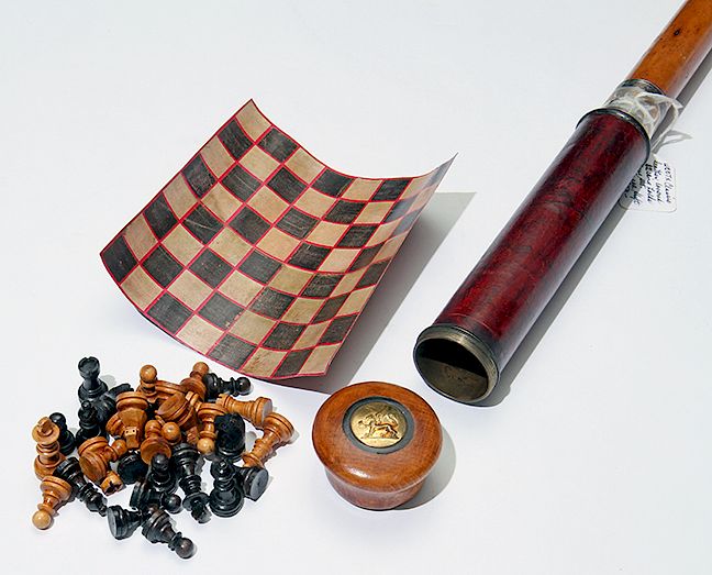 Appraisal: Chess Cane Exclusive on Bidsquare A wooden and leather handle