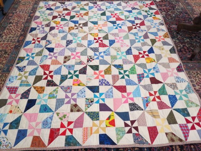 Appraisal: Handmade Quilt double pinwheel variation floral chintz border x