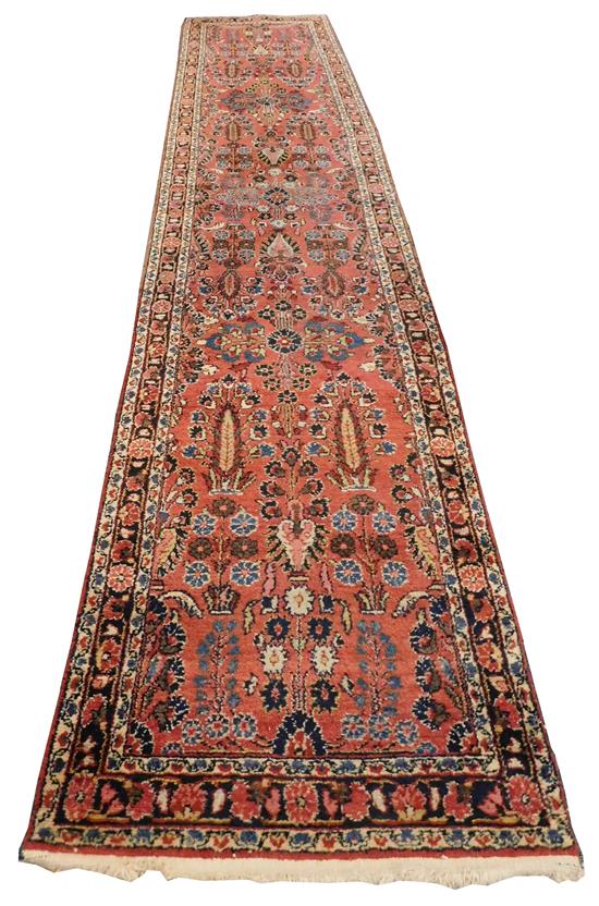 Appraisal: RUG Semi-Antique Persian Hamadan runner red ground foliate and wheat