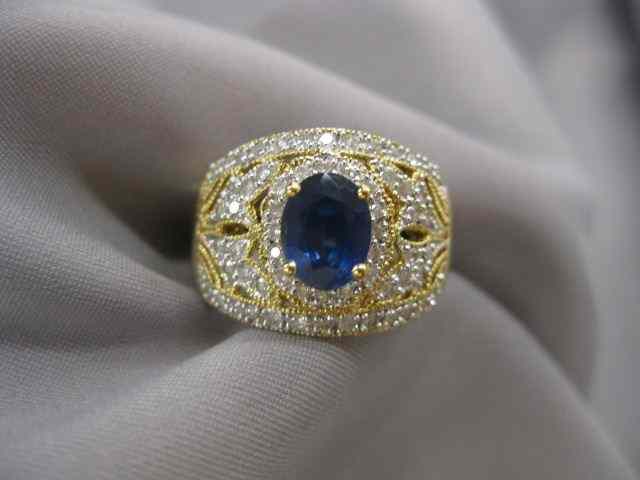 Appraisal: Sapphire Diamond Ring deep blue oval gem weighing carats and