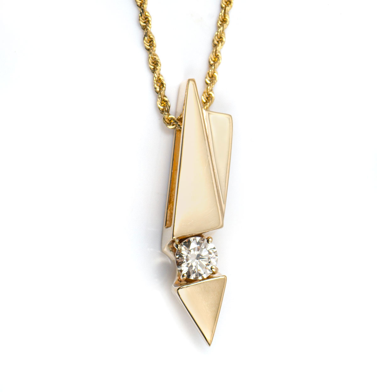 Appraisal: K GRAM CONTEMPORARY DIAMOND PENDANT s contemporary diamond pendant features