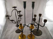 Appraisal: A pair of Arts and Crafts style gilt brass candlesticks