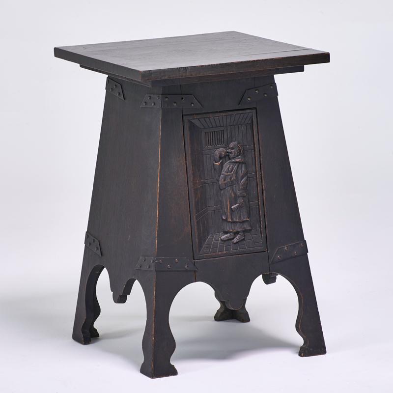 Appraisal: ARTS AND CRAFTS Flip-top cellarette with chip-carved door depicting a