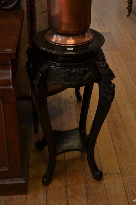 Appraisal: A PAIR OF CARVED EBONISED JARDINIERE STANDS A PAIR OF