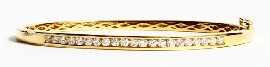 Appraisal: An ct gold oval hinged twenty one diamond bangle estimated