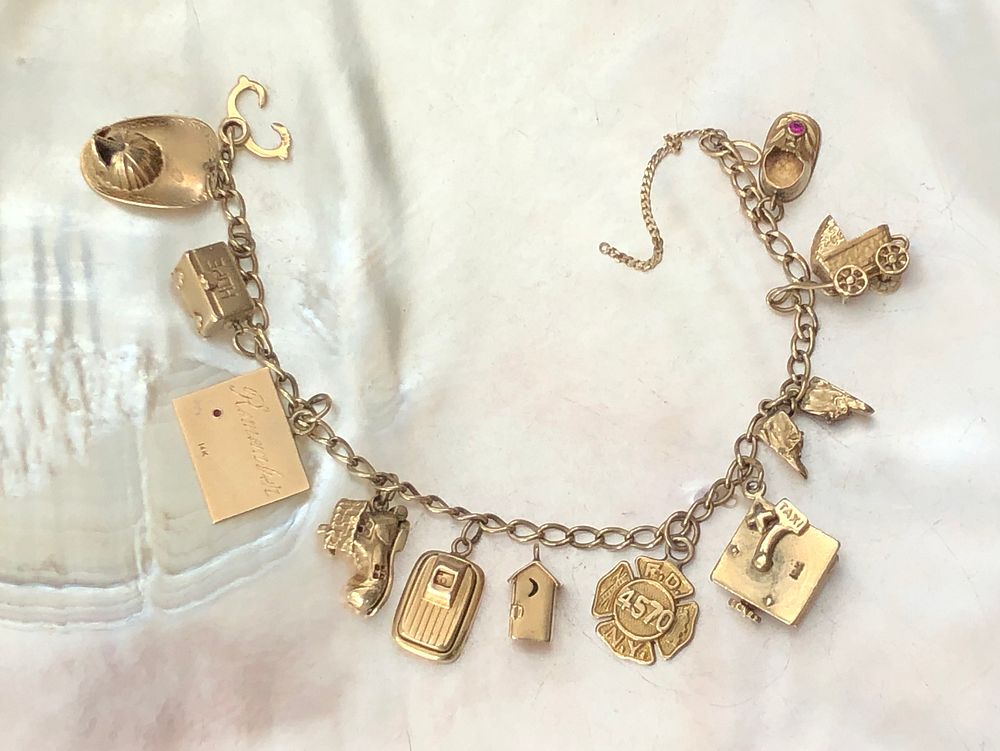 Appraisal: k Yellow Gold Charm Bracelet k Yellow Gold Charm Bracelet