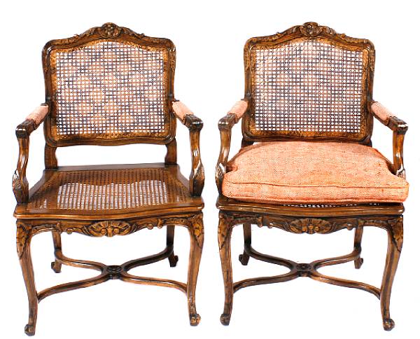 Appraisal: A pair of Louis XV style fauteuils height in width