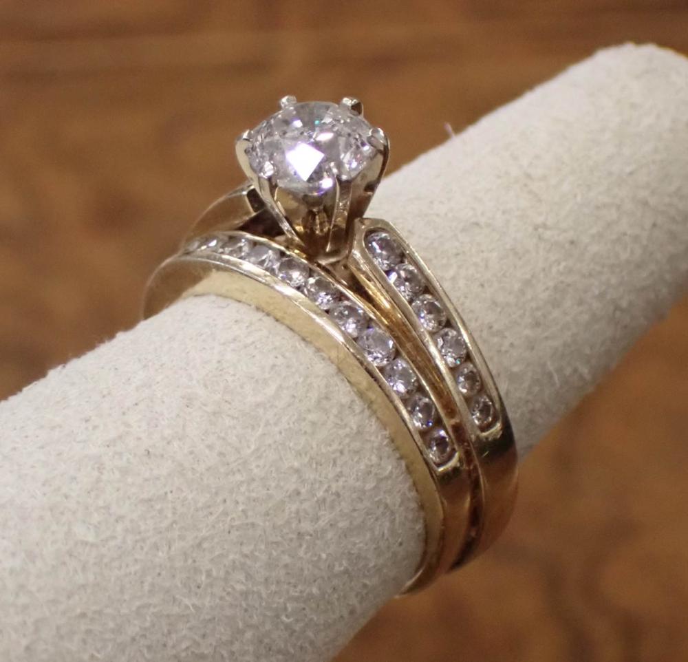 Appraisal: ESTATE DIAMOND AND FOURTEEN KARAT GOLD WEDDING SET including a