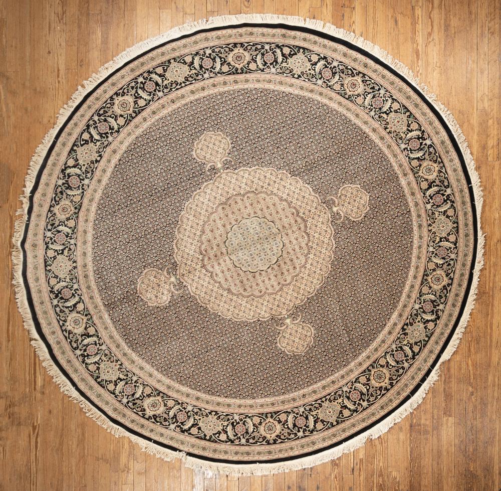 Appraisal: Tabriz Silk and Wool Circular Carpet central medallion overall floral