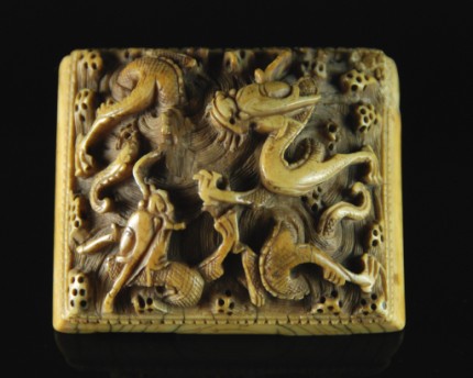 Appraisal: Rectangular shape with beveled top carved in relief with two