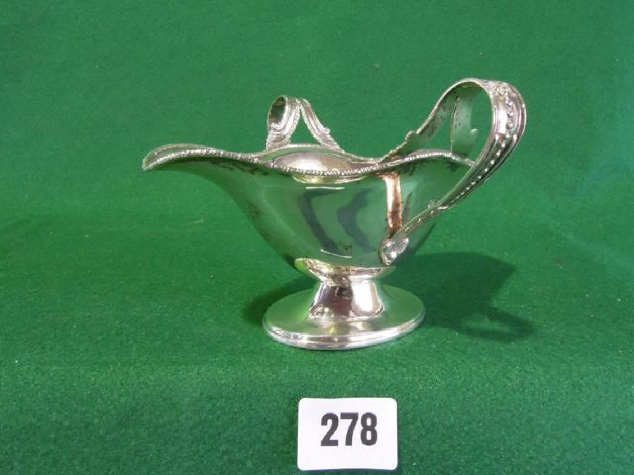 Appraisal: A two handled silver sauce dish hallmarked George Nathan Ridley