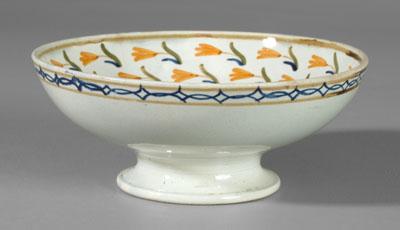 Appraisal: Pearlware rum tazza interior with bands of orange flowers encircling