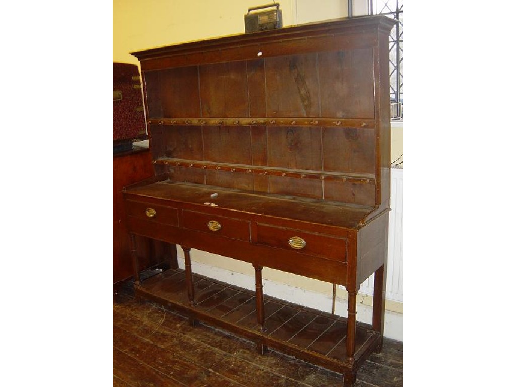 Appraisal: An early th century oak dresser the base fitted with