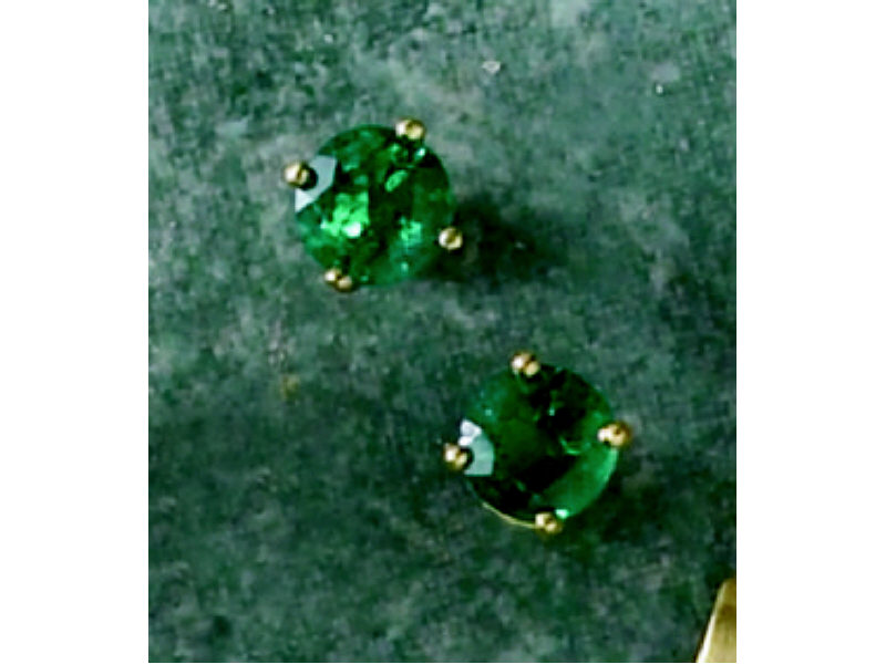 Appraisal: EMERALD STUD EARRINGS Yellow gold four prong earrings set with