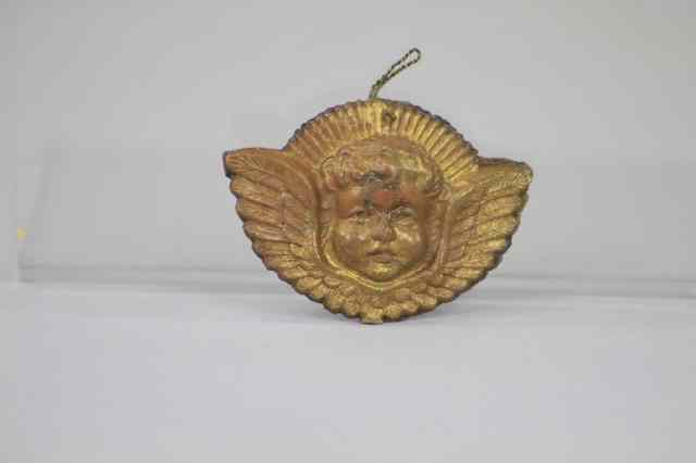 Appraisal: GOLD ANGEL HEAD DRESDEN ORNAMENT A small two sided golden