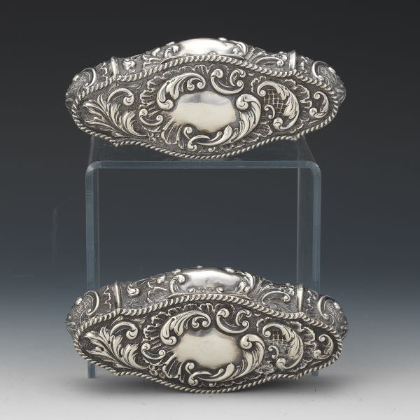 Appraisal: PAIR OF ENGLISH STERLING SILVER BAROQUE STYLE TRINKET BOXES BY