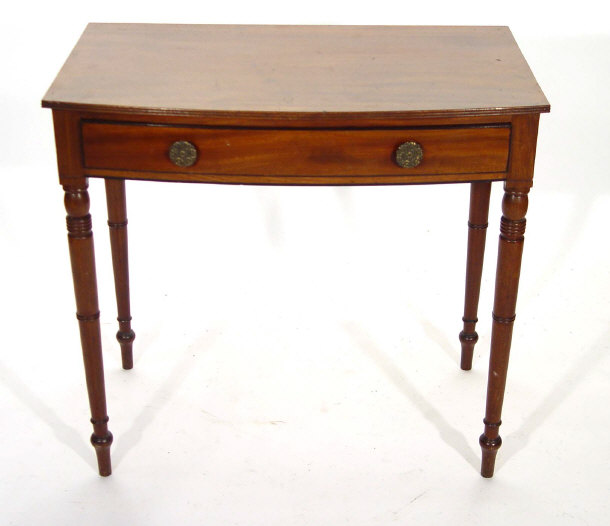 Appraisal: Victorian walnut bow front hall table fitted a frieze drawer