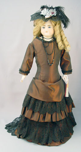 Appraisal: EARLY TH BISQUE HEAD FASHION DOLL Beautifully dressed in a