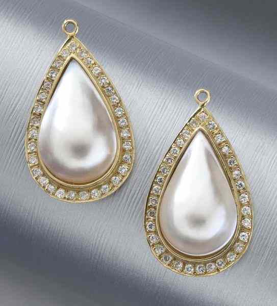 Appraisal: Pr K gold diamond and mabe pearl earringjackets featuring a