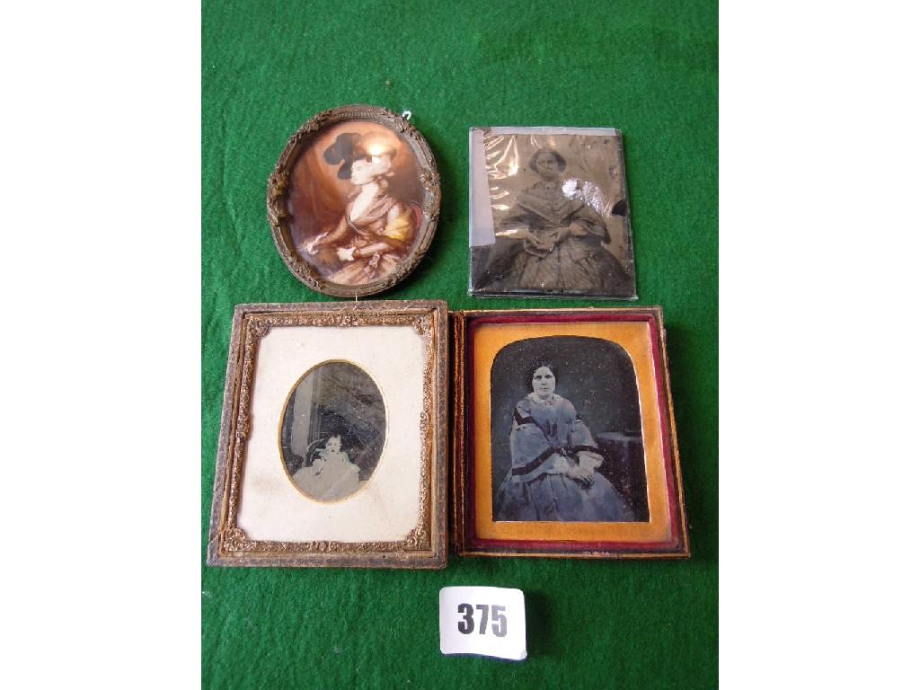 Appraisal: Three th century photographic portrait plates cameo brooch opera glasses