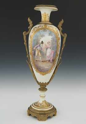 Appraisal: A Sevres Style Urn th Century Oval hand painted vignettes