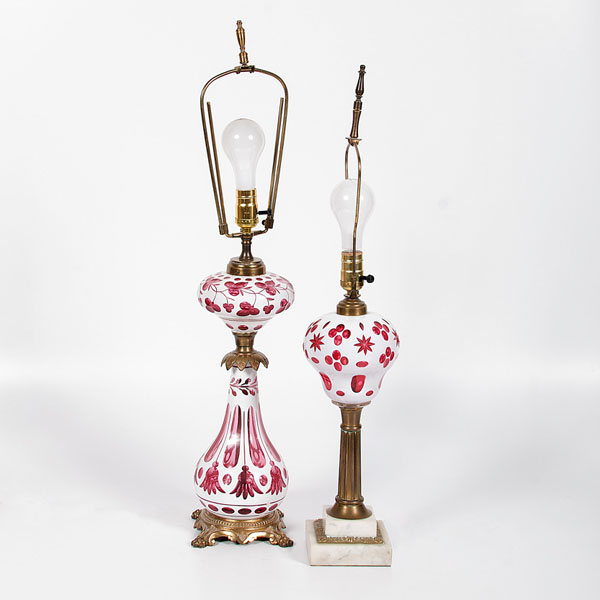 Appraisal: American late th-early th century Two glass lamps with white