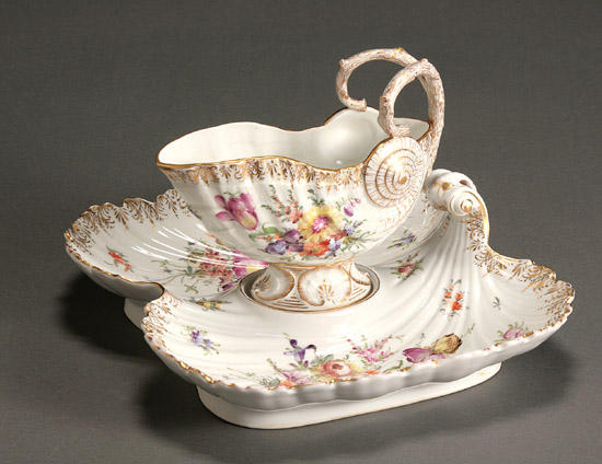 Appraisal: Dresden Floral Decorated Two-Part Serving Dish with Sauceboat Possibly Franziska