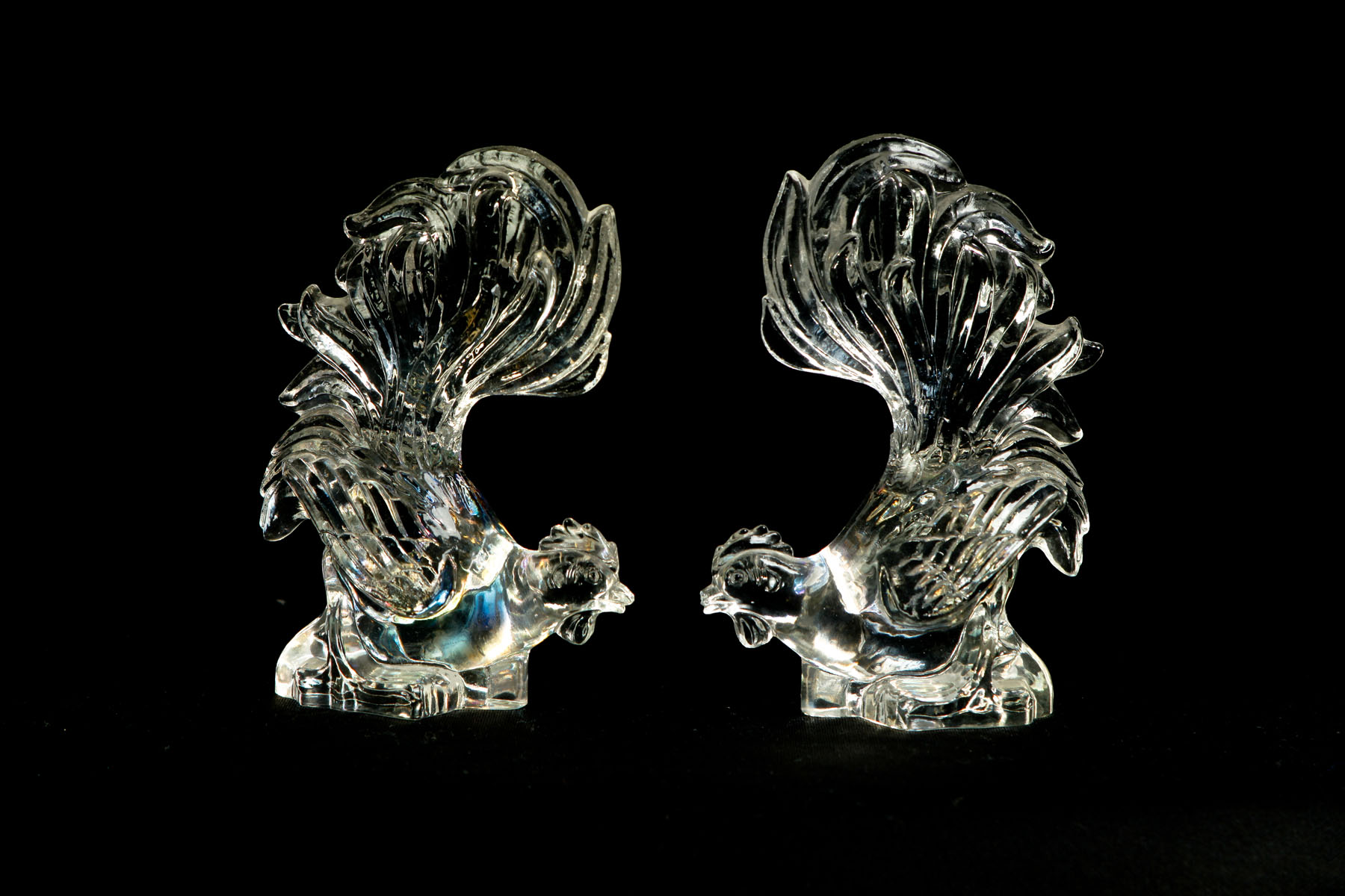 Appraisal: PAIR OF HEISEY ROOSTERS Ohio mid th century Pair of