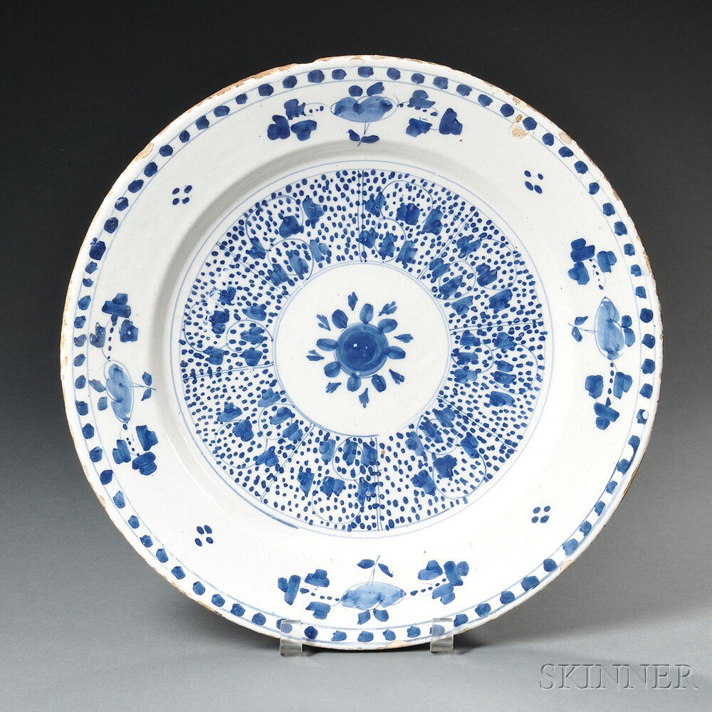 Appraisal: Delftware Blue and White Floral-decorated Charger England th century dot