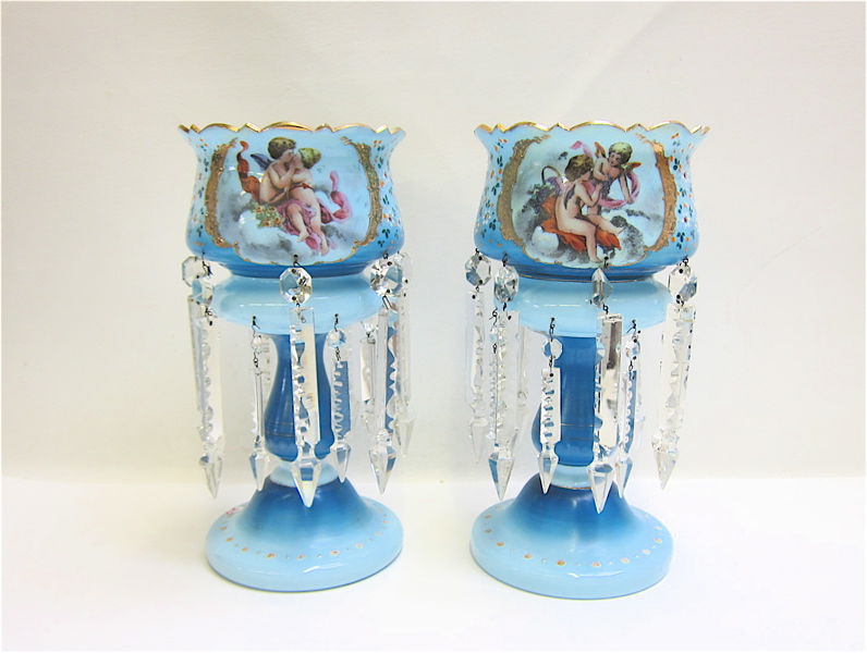 Appraisal: PAIR OF BLUE GLASS VICTORIAN LUSTERS having decorative reserves with