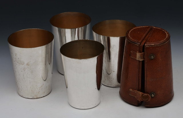 Appraisal: A GRADUATED SET OF FOUR SILVER PLATED TUMBLERS interfitting in