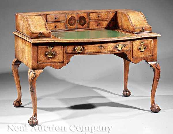 Appraisal: An Antique Georgian-Style Carved Walnut Carlton House Desk th c