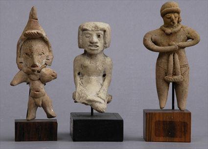 Appraisal: THREE PRE-COLUMBIAN TERRACOTTA FIGURES ON STANDS to in Provenance Property