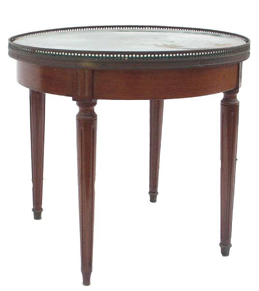 Appraisal: A Louis XVI style mahogany coffee table height diameter in