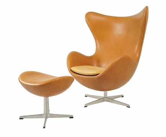 Appraisal: ARNE JACOBSEN - AN EGG CHAIR AND OTTOMAN DESIGNED manufactured