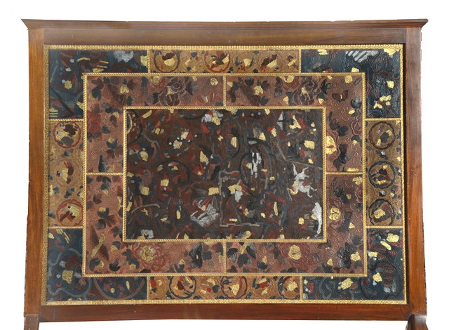 Appraisal: AN EMBOSSED LEATHER FIRE SCREEN decorated oriental figure scenes in