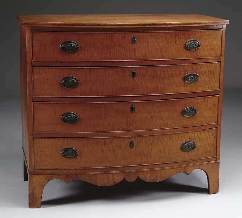 Appraisal: CURLY MAPLE BOW FRONT FOUR DRAWER CHEST Each drawer with